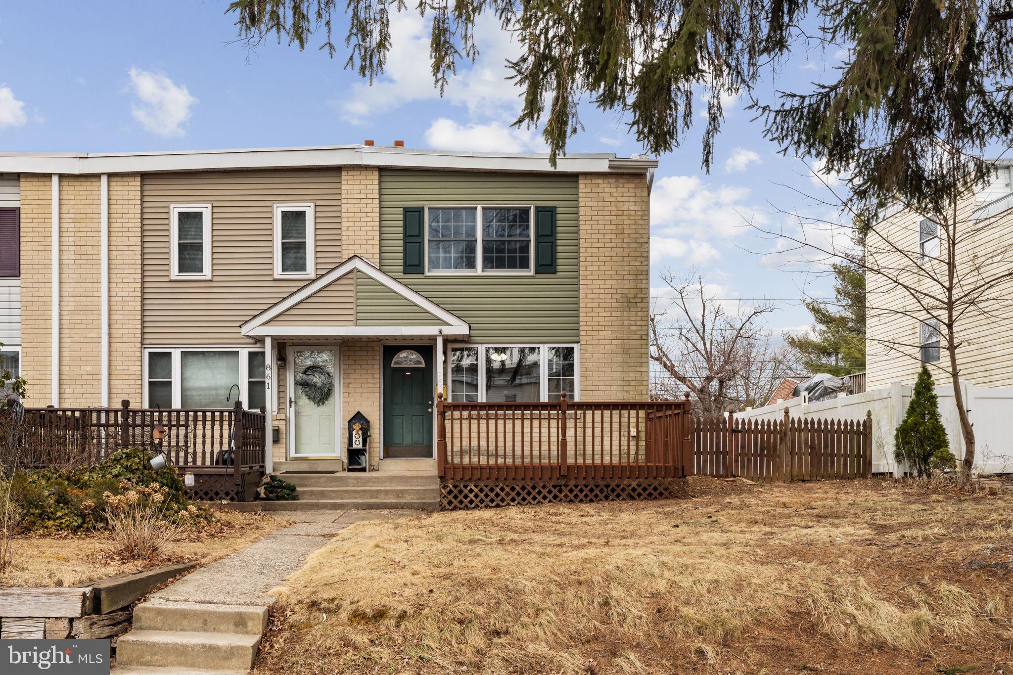 859 Andover Road Lansdale, PA 19446 - Photo 4 of 44 a front view of a house with a yard