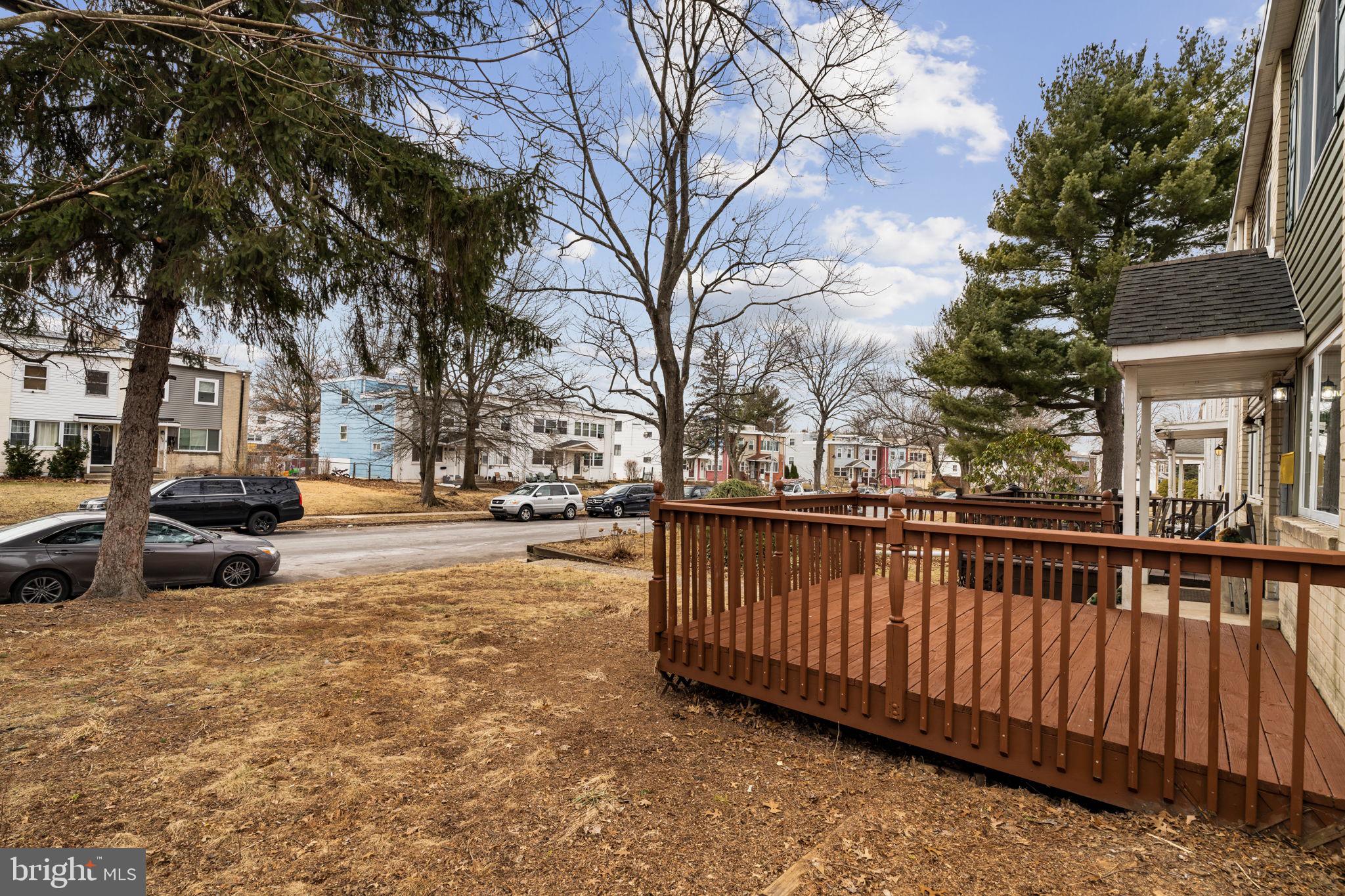 859 Andover Road Lansdale, PA 19446 - Photo 7 of 44 a view of street with wooden bench and trees