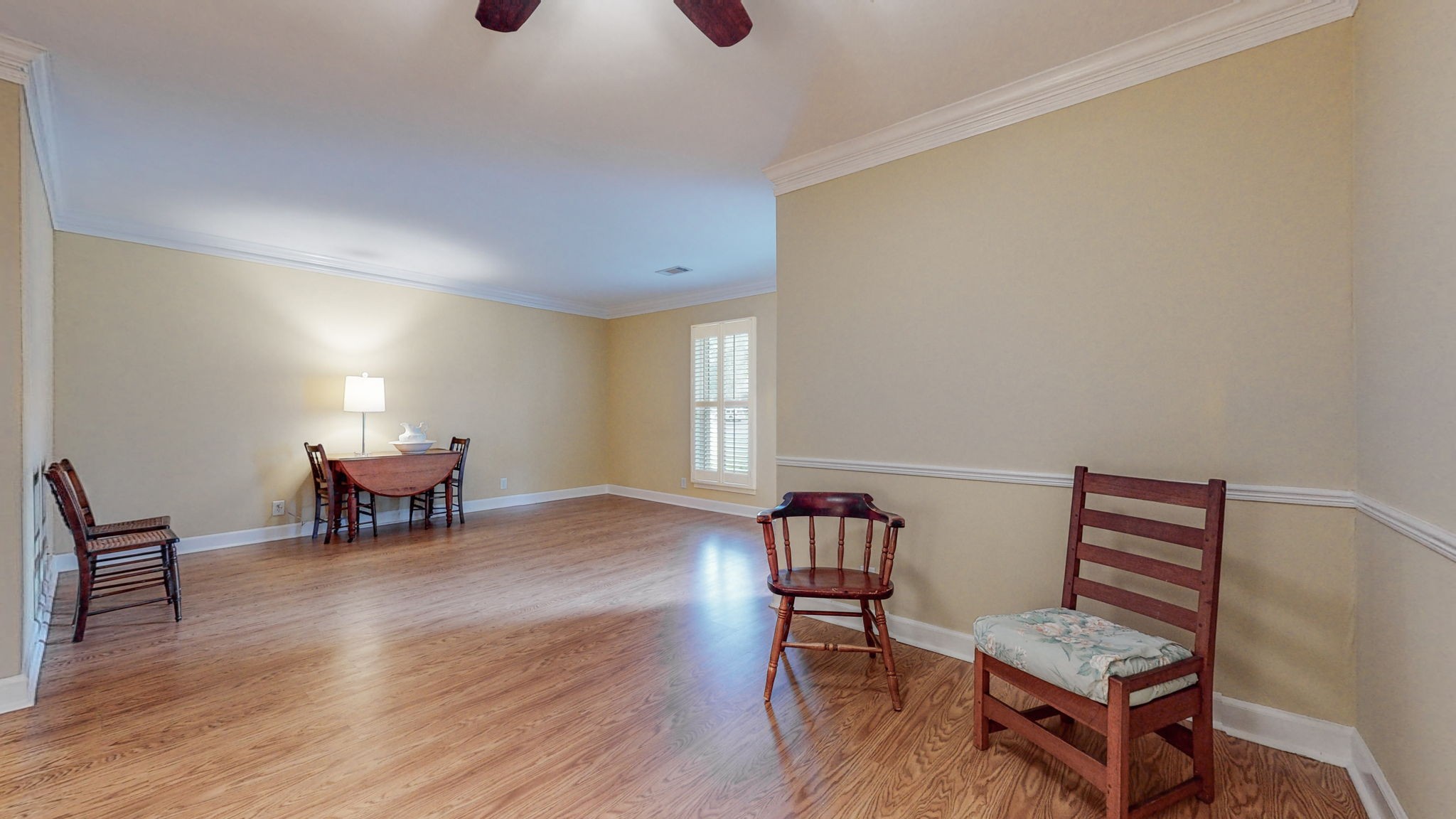 624 General George Patton Road Nashville, TN 37221 - Photo 5 of 45 a living room with furniture and a dining table with wooden floor