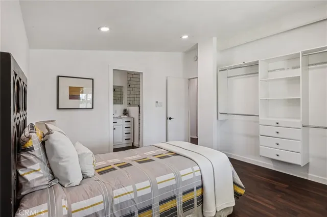 a bedroom with a bed and furniture