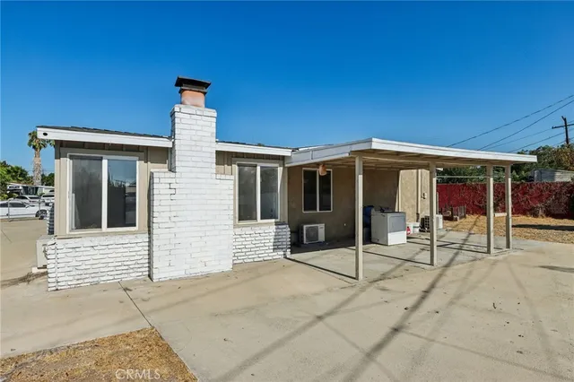 a view of house with outdoor space and porch