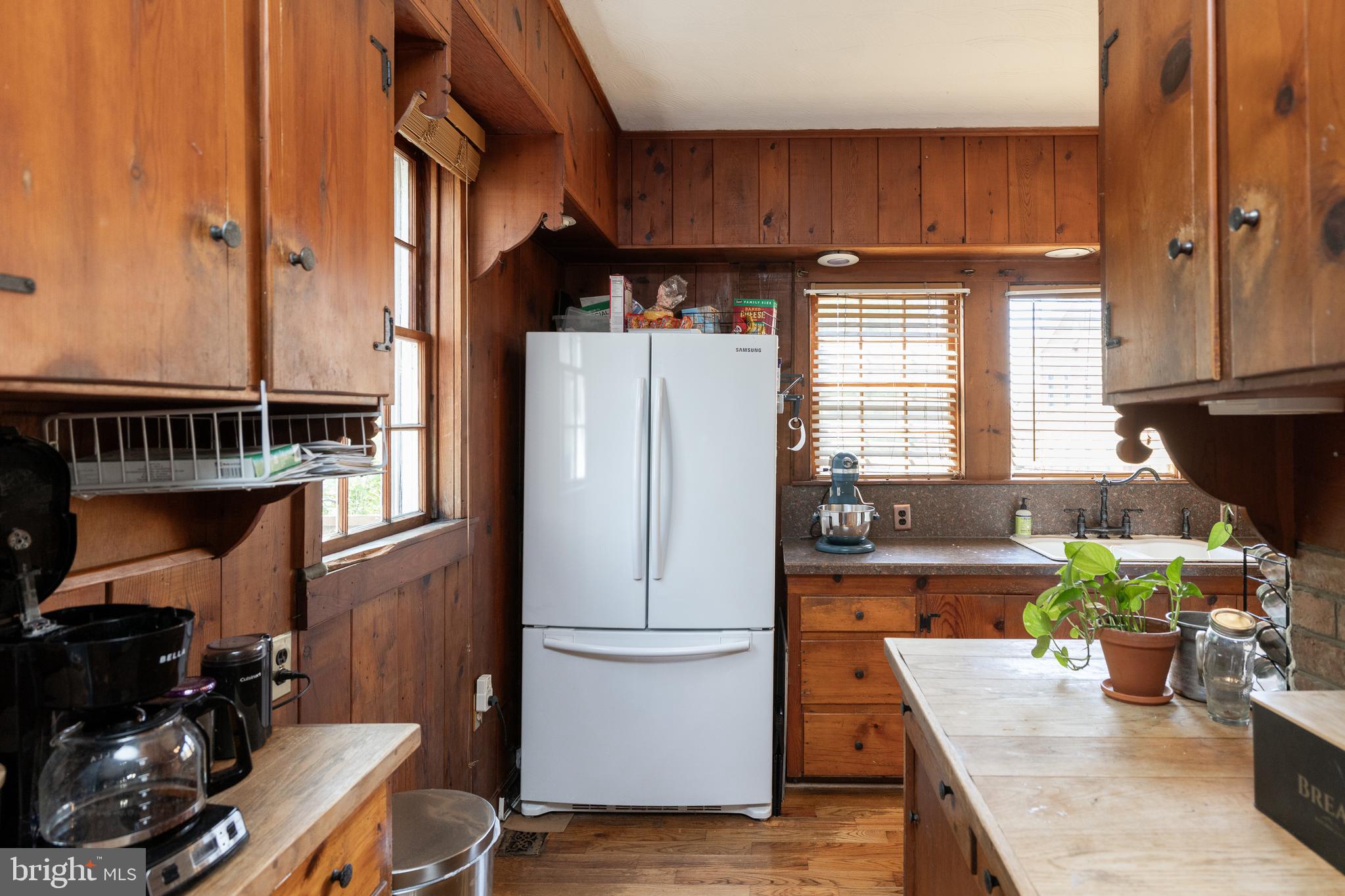 5378 Main Street Stephens City, VA 22655 - Photo 17 of 58 a kitchen with a refrigerator and a stove top oven