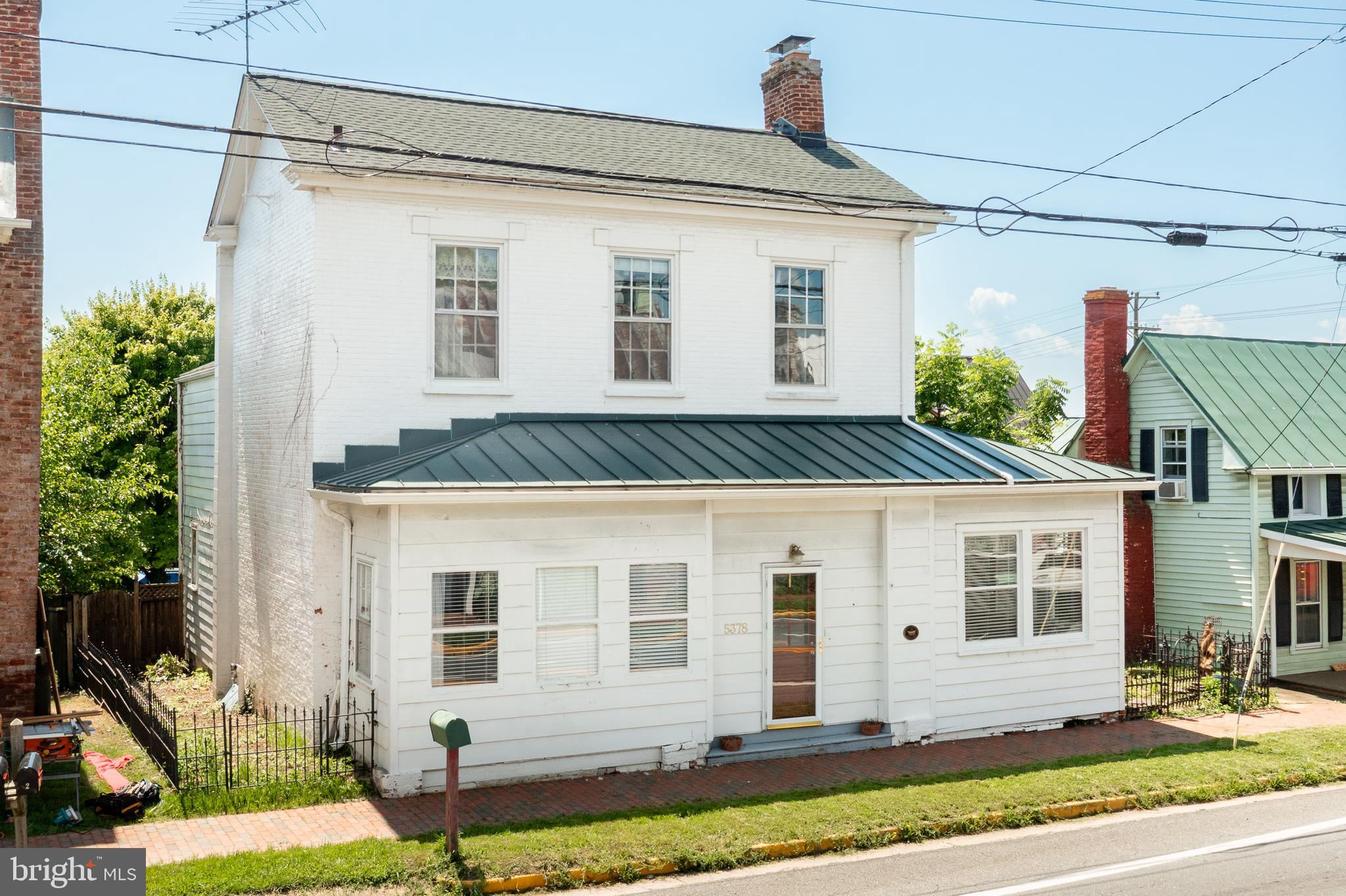 5378 Main Street Stephens City, VA 22655 - Photo 2 of 58 a front view of a house with a yard