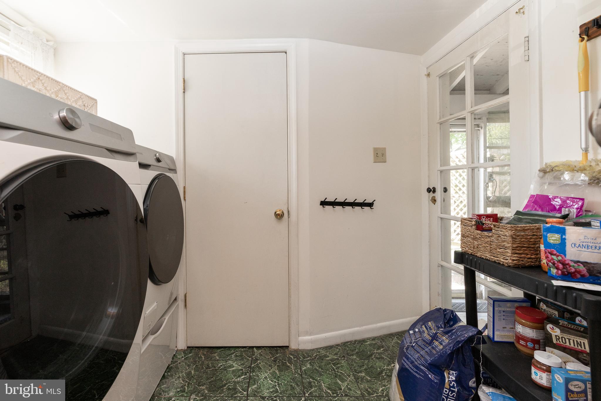 5378 Main Street Stephens City, VA 22655 - Photo 23 of 58 a view of storage and utility room with washer and dryer