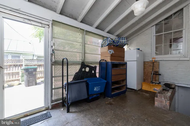 a view of a storage room with furniture