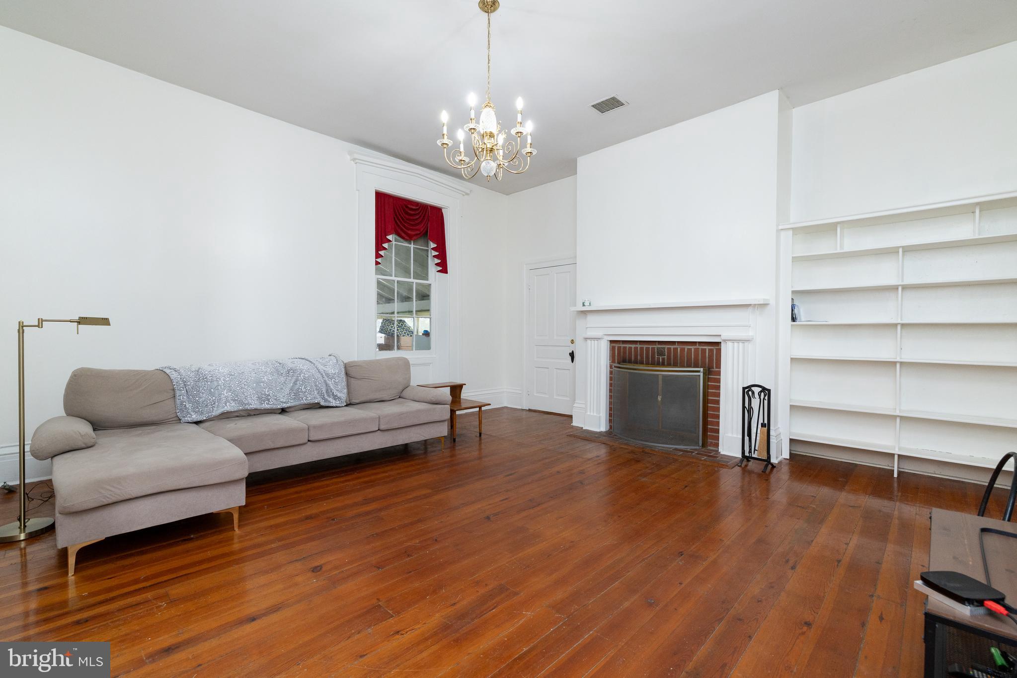5378 Main Street Stephens City, VA 22655 - Photo 4 of 58 a living room with furniture and a fireplace
