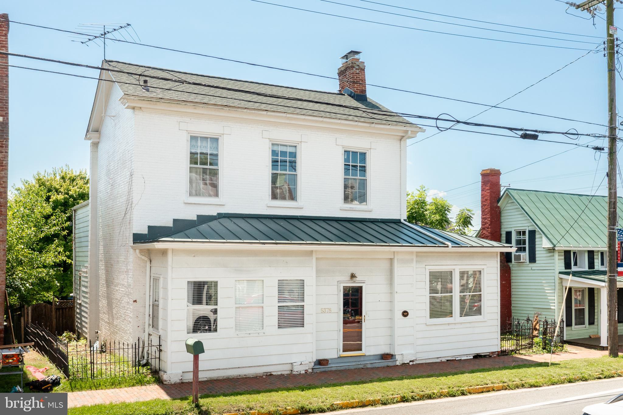 5378 Main Street Stephens City, VA 22655 - Photo 49 of 58 a front view of a house with a yard