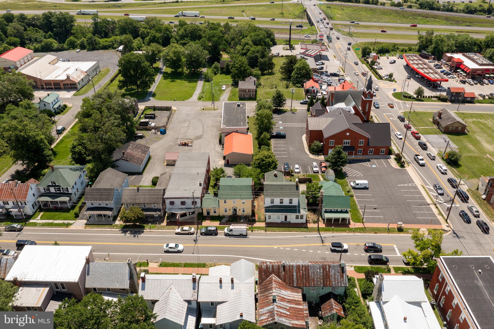5378 Main Street Stephens City, VA 22655 - Photo 52 of 58 an aerial view of a building with outdoor space and lake view