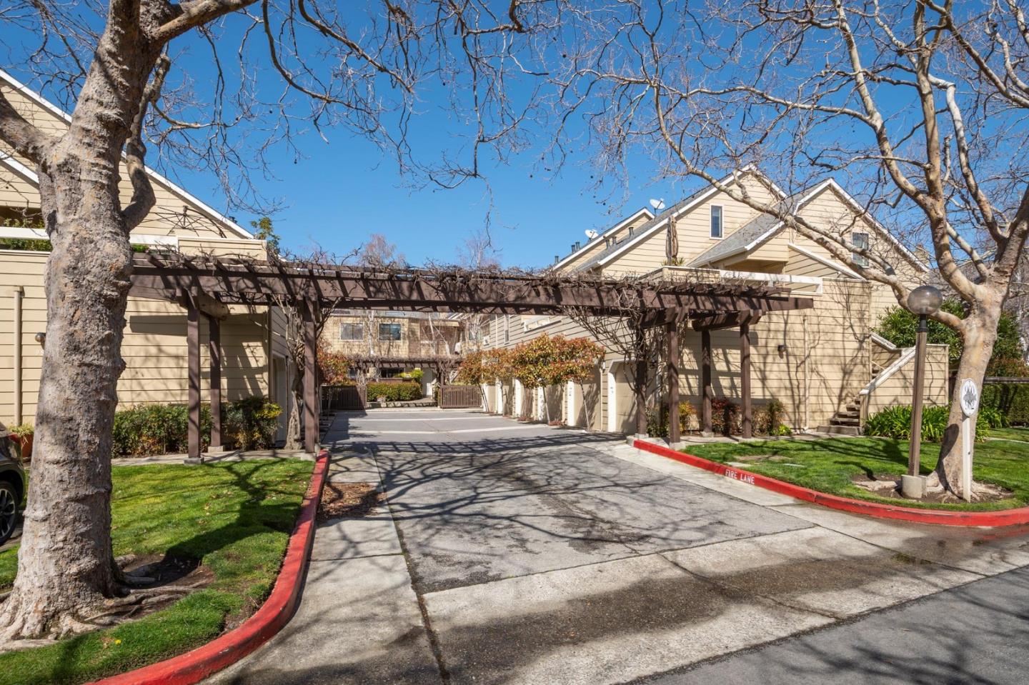 964 Shoreline Drive San Mateo, CA 94404 - Photo 2 of 19 a view of a building with a yard