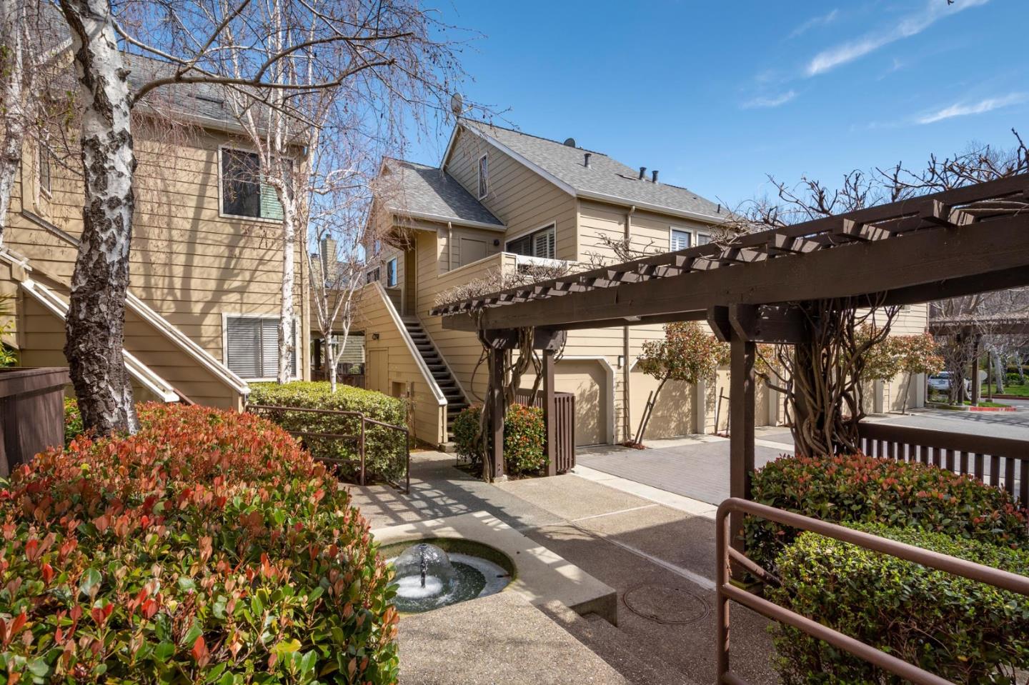 964 Shoreline Drive San Mateo, CA 94404 - Photo 3 of 19 a view of a house with a roof deck