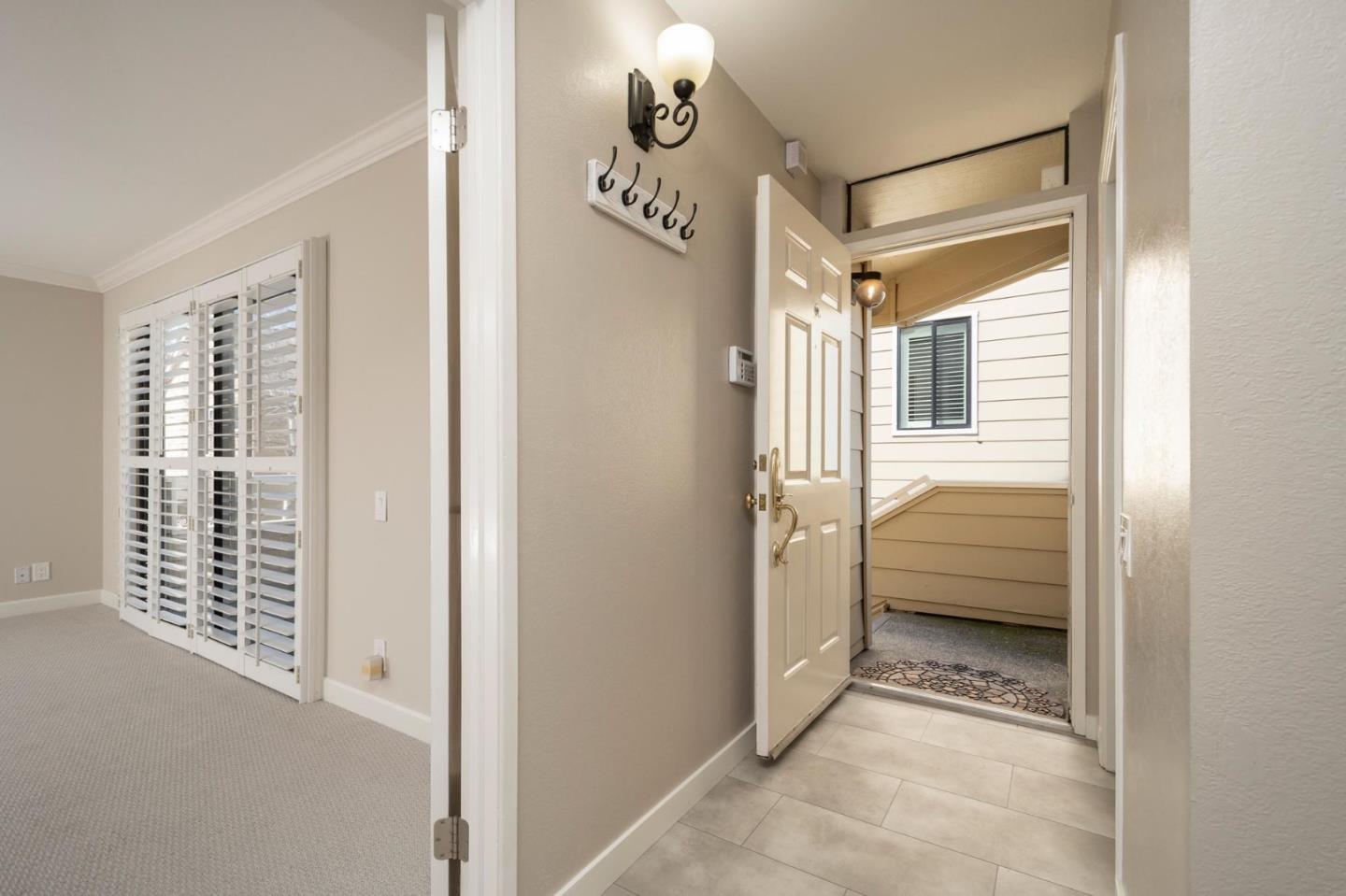 964 Shoreline Drive San Mateo, CA 94404 - Photo 4 of 19 a view of a hallway and a wardrobe