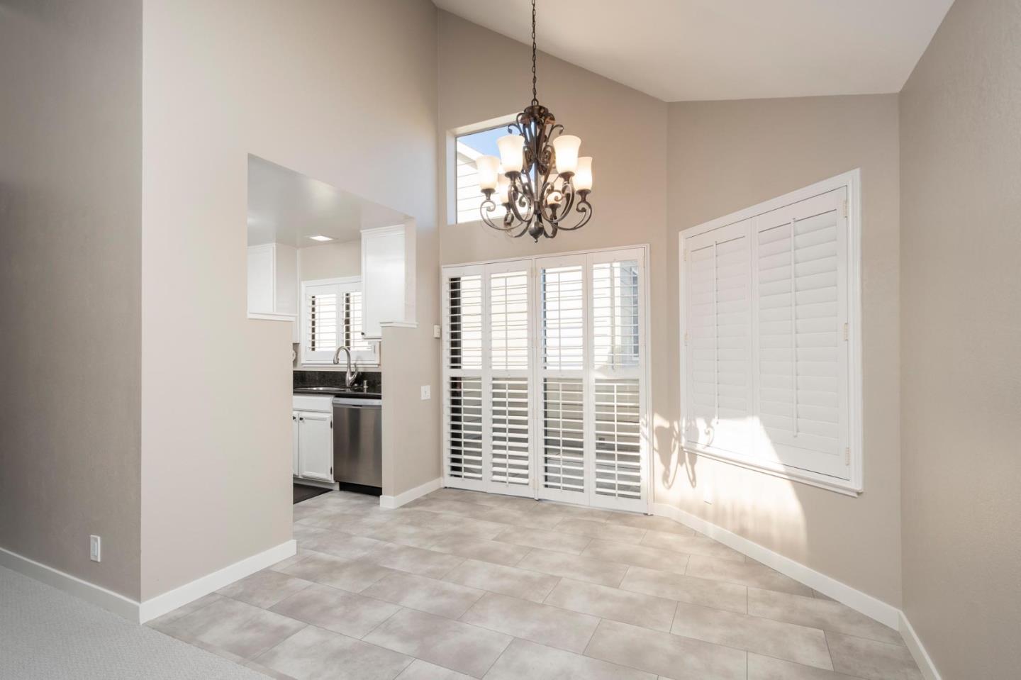 964 Shoreline Drive San Mateo, CA 94404 - Photo 6 of 19 a view of a room with a windows and a chandelier