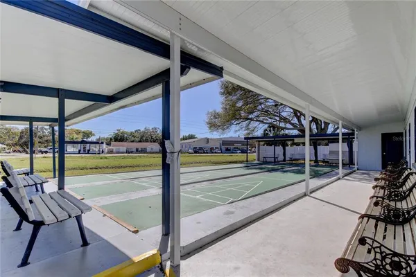 a view of swimming pool with patio