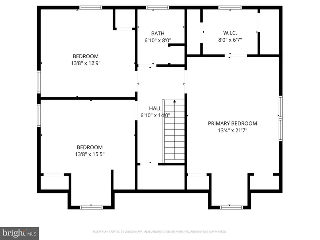 a black and white photo of a living room