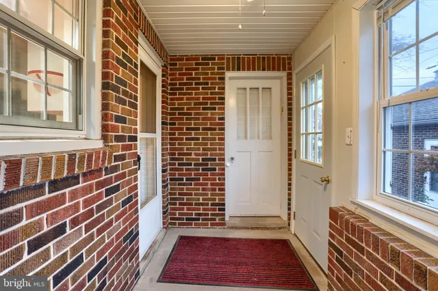 a view of a room with windows
