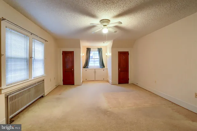 an empty room with windows