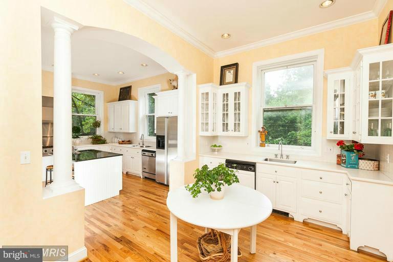 108 Ridgewood Road Baltimore, MD 21210 - Photo 11 of 30 a kitchen with a refrigerator and a stove