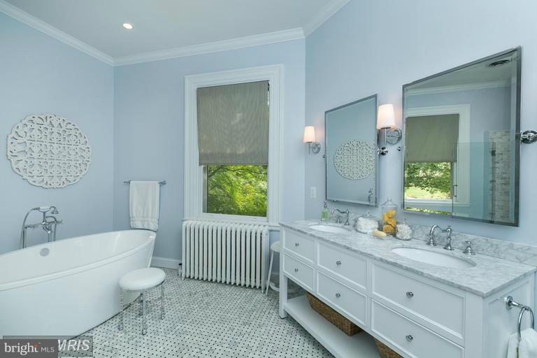 108 Ridgewood Road Baltimore, MD 21210 - Photo 15 of 30 a bathroom with a granite countertop sink and a mirror