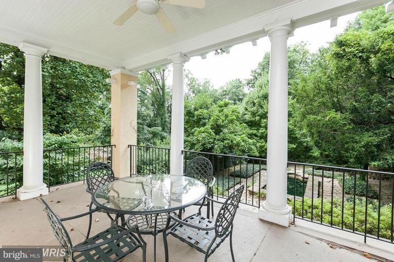 108 Ridgewood Road Baltimore, MD 21210 - Photo 26 of 30 a view of a two chairs in the porch