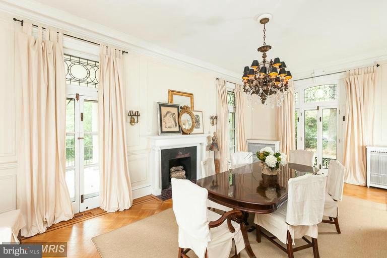 108 Ridgewood Road Baltimore, MD 21210 - Photo 6 of 30 a living room with furniture and a fireplace