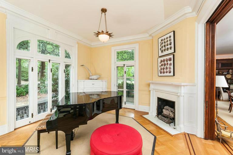 108 Ridgewood Road Baltimore, MD 21210 - Photo 8 of 30 a living room with furniture and a fireplace