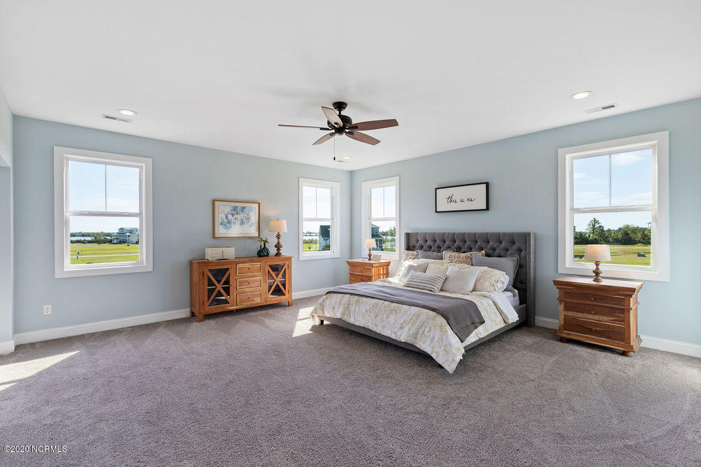 817 Sweetgrass Street Holly Ridge, NC 28445 - Photo 32 of 60 Master Bedroom with views of Pond