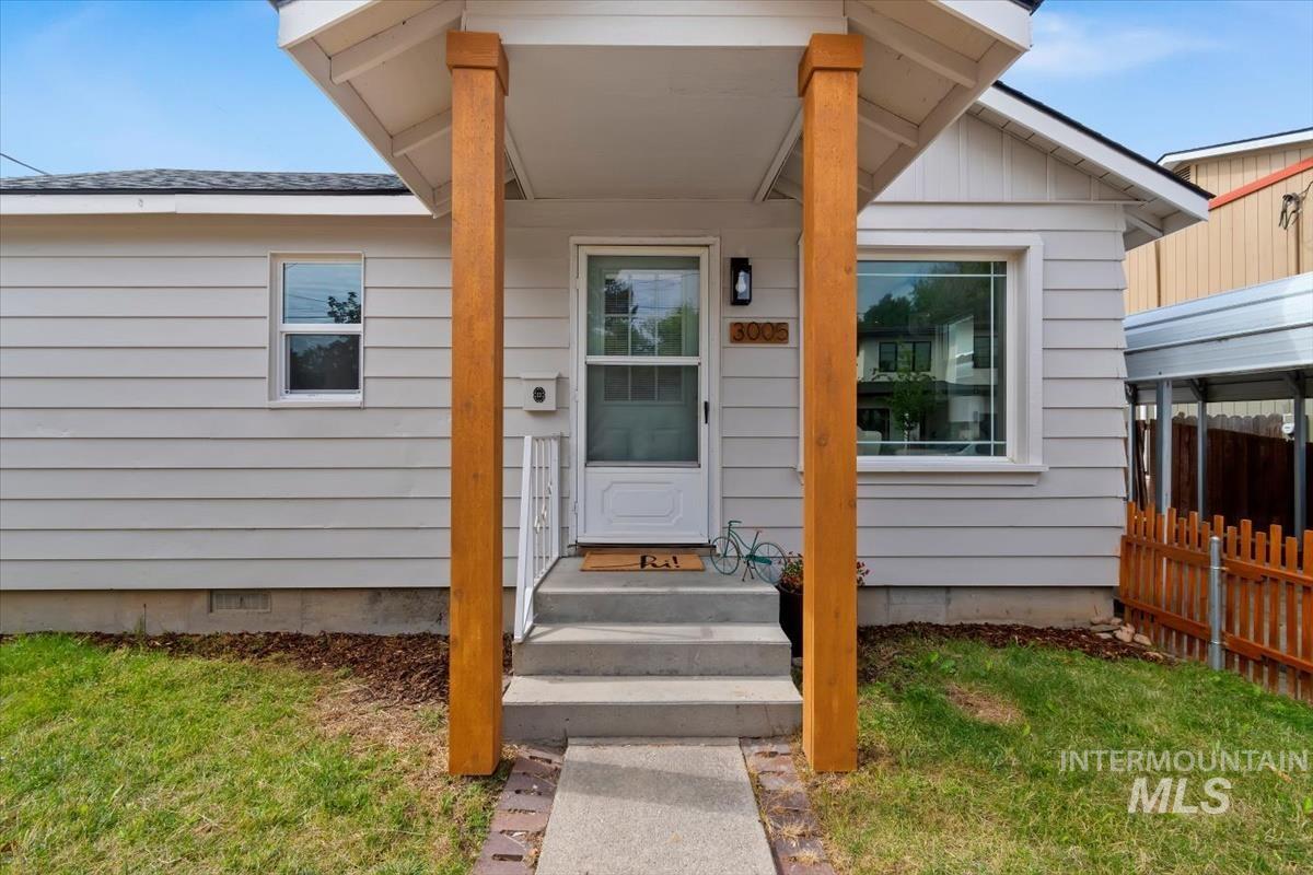 3005 West Hester Street Boise, ID 83702 - Photo 2 of 32 Welcoming front porch featuring natural wood pillars and a covered entry