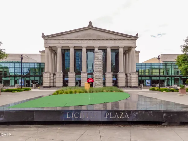 a view of a building with a street