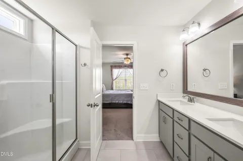 a bed room with a bed and a couch