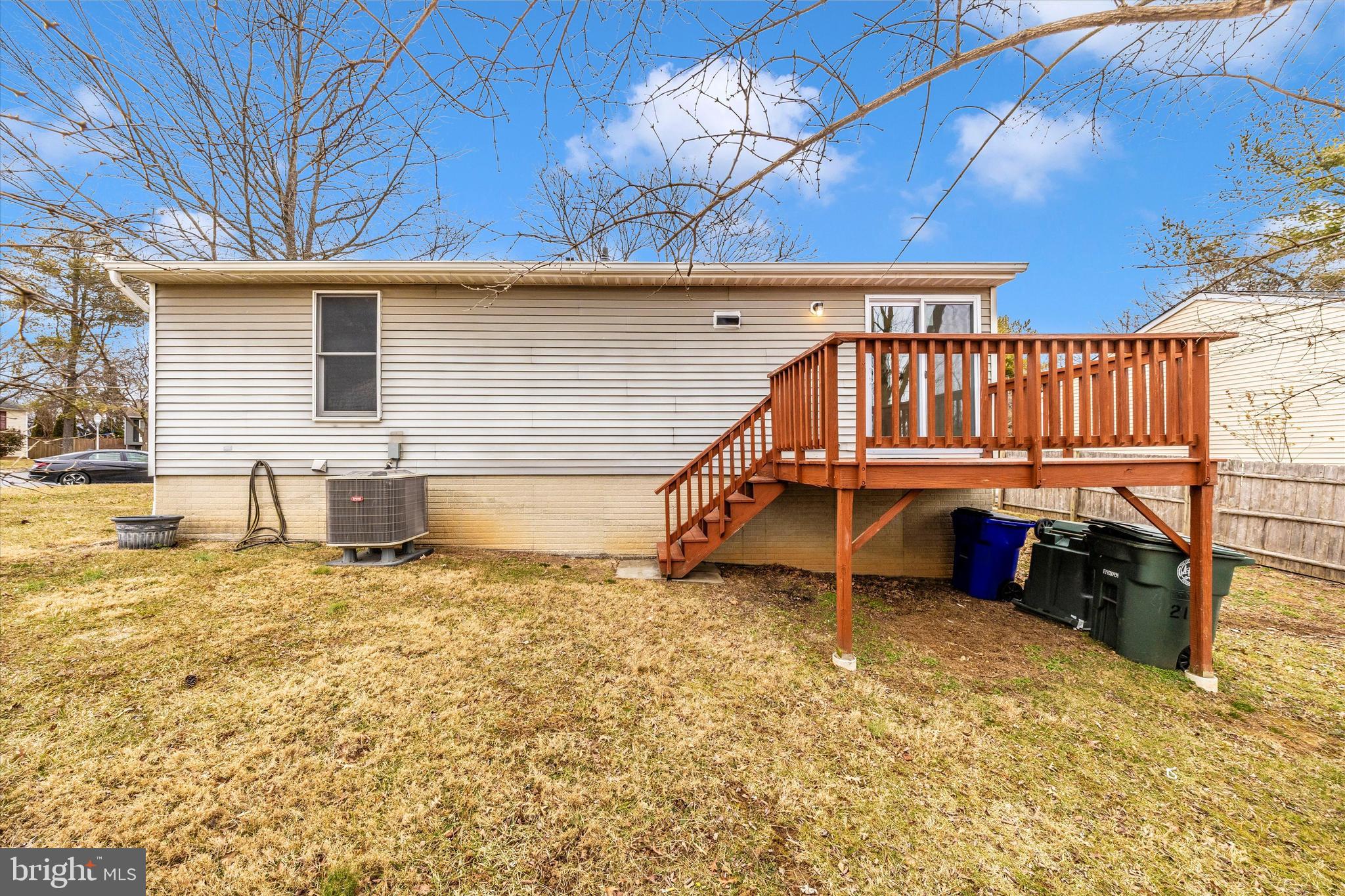 214 Savage Road Frederick, MD 21702 - Photo 20 of 25 front view of a house with a wooden fence