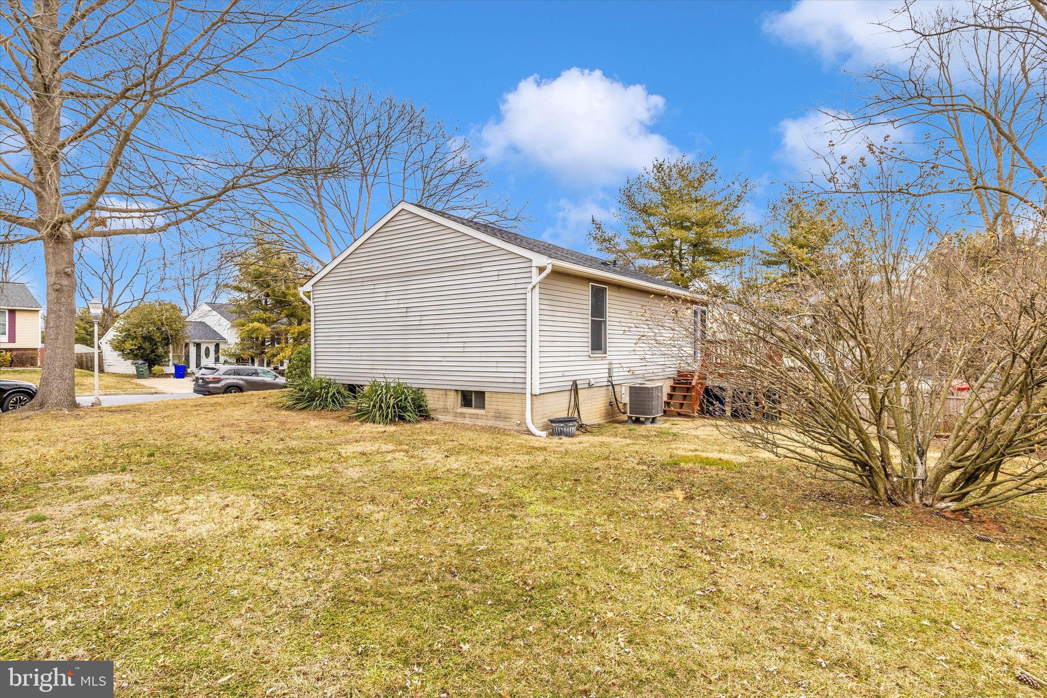 214 Savage Road Frederick, MD 21702 - Photo 22 of 25 a view of a house with a yard and garage