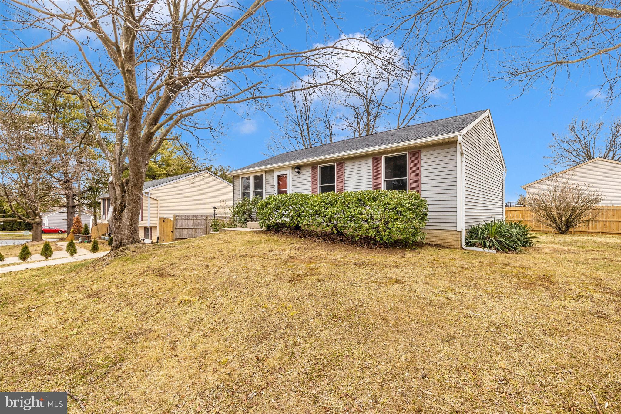 214 Savage Road Frederick, MD 21702 - Photo 24 of 25 a front view of a house with a yard and garage
