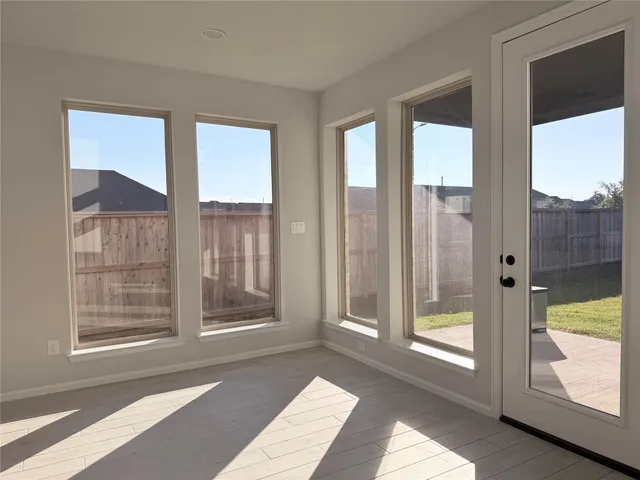 a view of a room with a large window