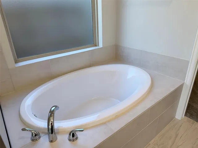 view of a bathtub in a bathroom
