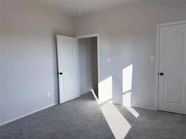a view of an empty room with window