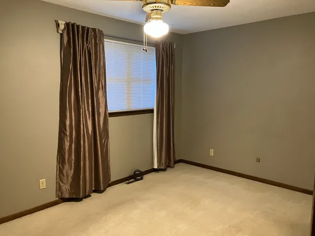 a view of a room with a door