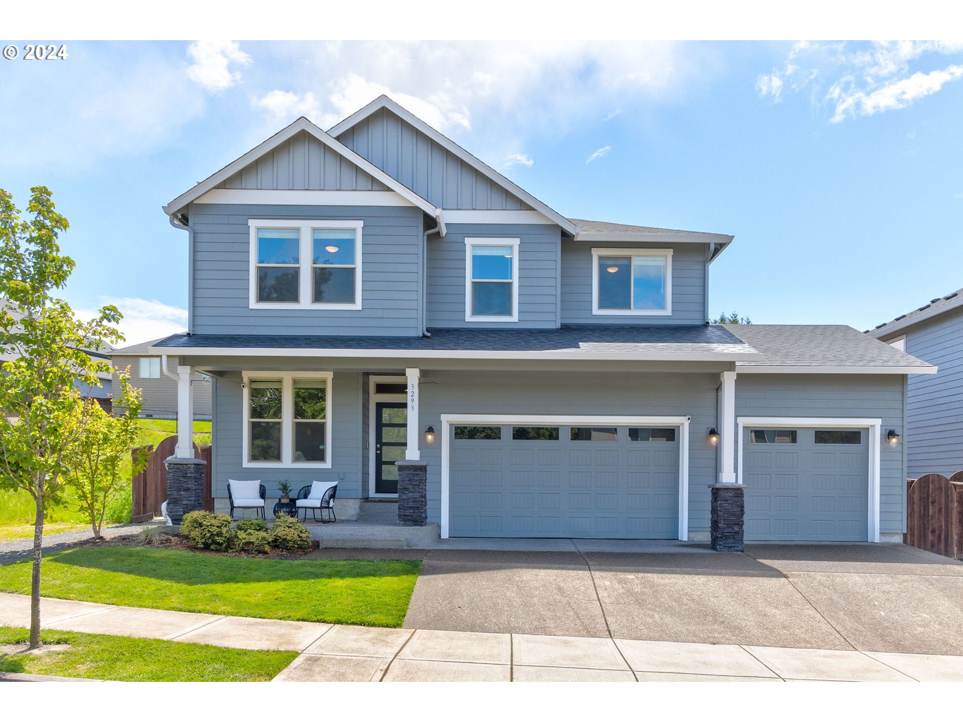 3293 North 10th Street Ridgefield, WA 98642 - Photo 1 of 47 a view of a yard in front view of a house