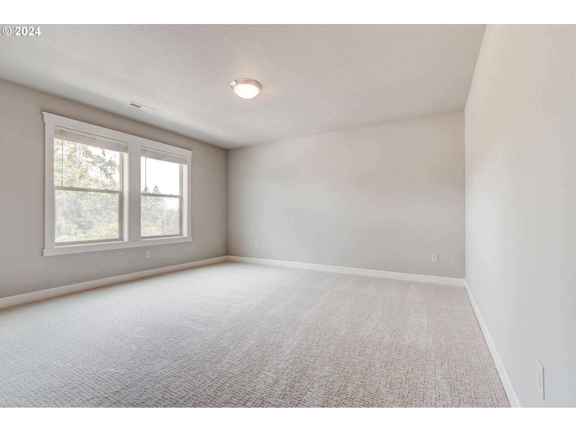 3293 North 10th Street Ridgefield, WA 98642 - Photo 27 of 47 a view of an empty room with a window