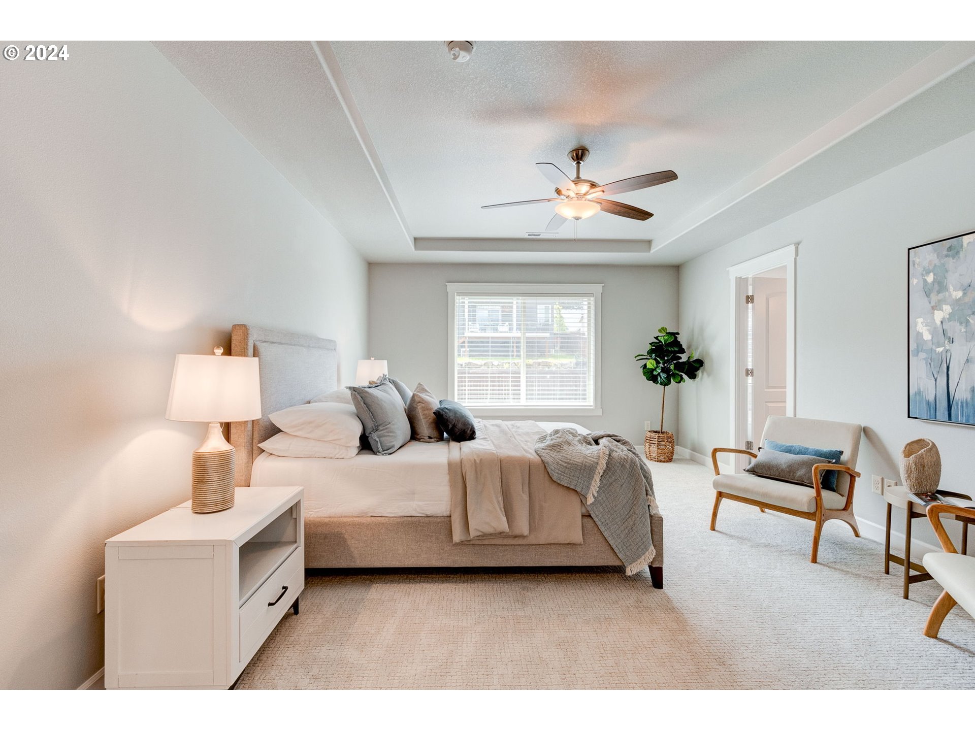 3293 North 10th Street Ridgefield, WA 98642 - Photo 29 of 47 a bedroom with furniture and a chandelier