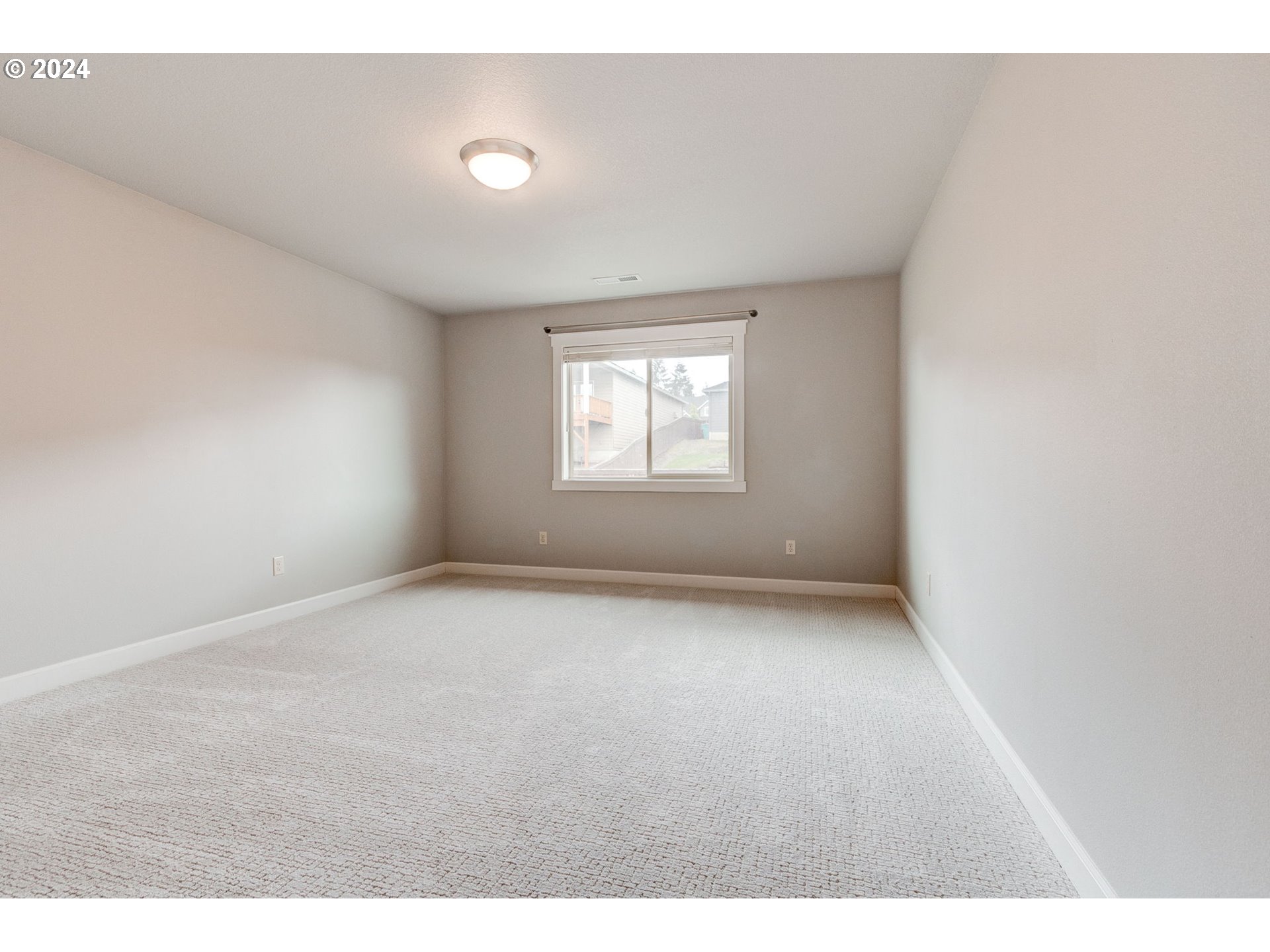 3293 North 10th Street Ridgefield, WA 98642 - Photo 36 of 47 a view of an empty room with a window