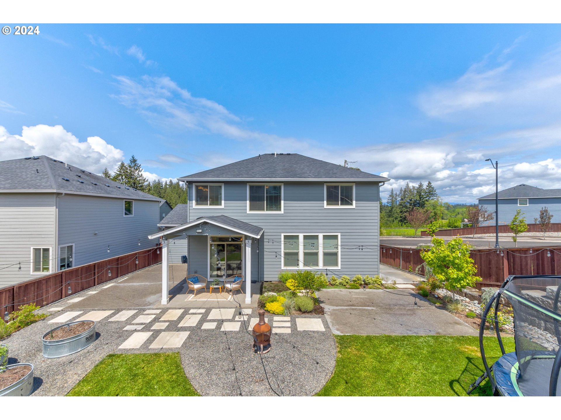 3293 North 10th Street Ridgefield, WA 98642 - Photo 42 of 47 a balcony with table and chairs