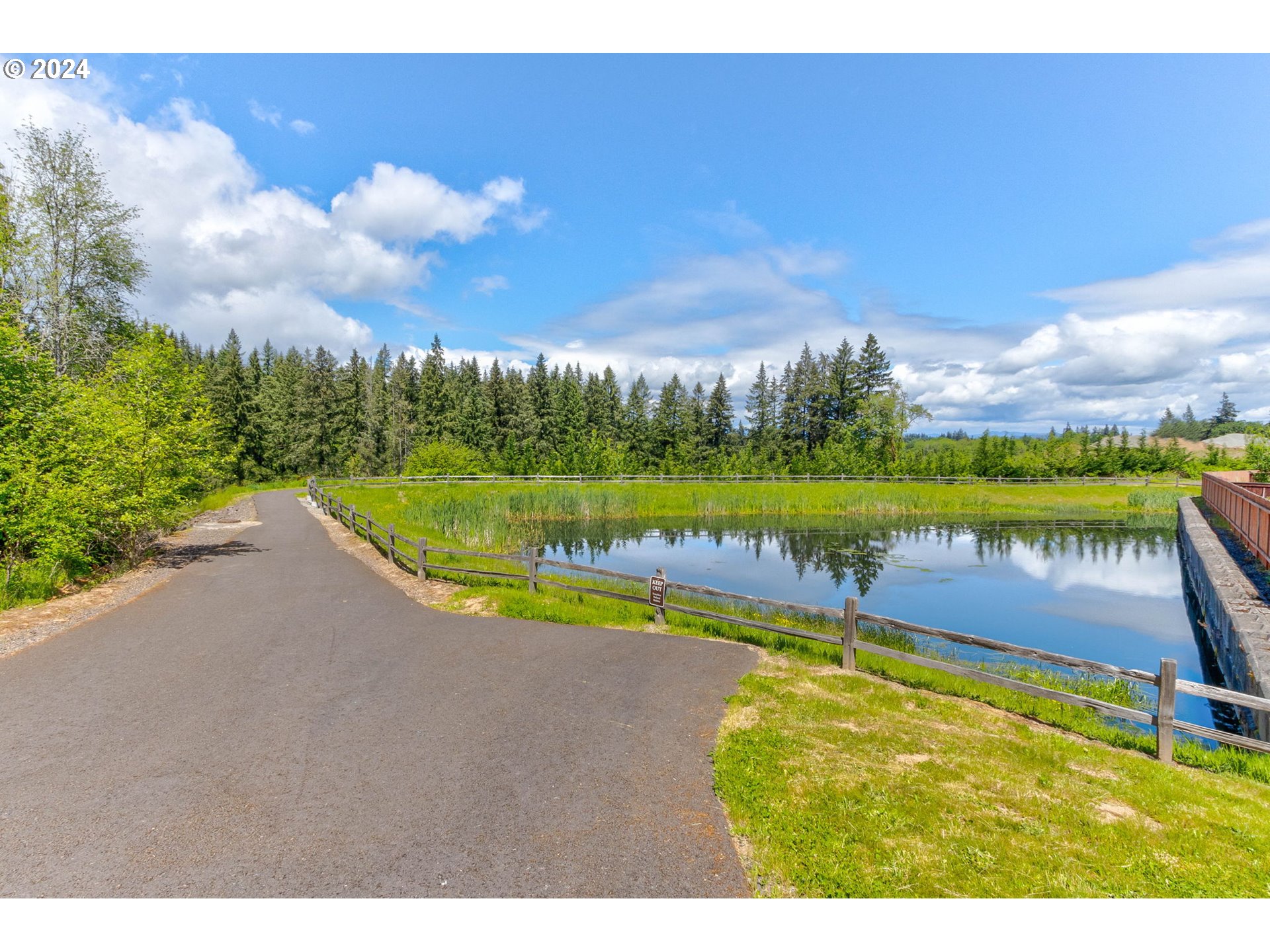 3293 North 10th Street Ridgefield, WA 98642 - Photo 46 of 47 a view of a swimming pool with a yard