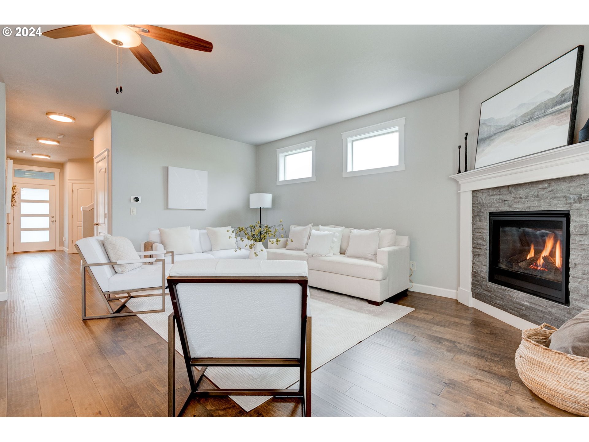 3293 North 10th Street Ridgefield, WA 98642 - Photo 10 of 47 a living room with furniture and a fireplace