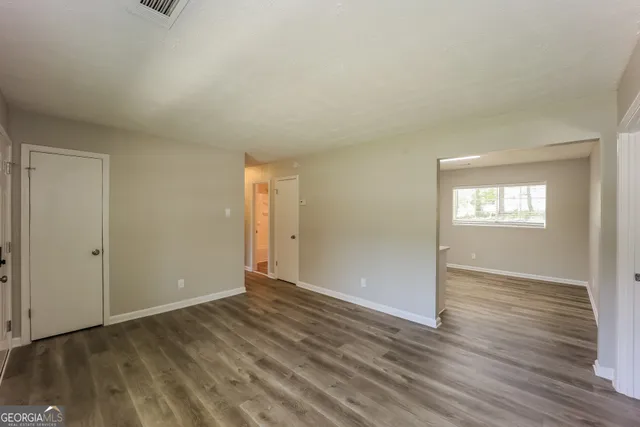 a view of an empty room and window