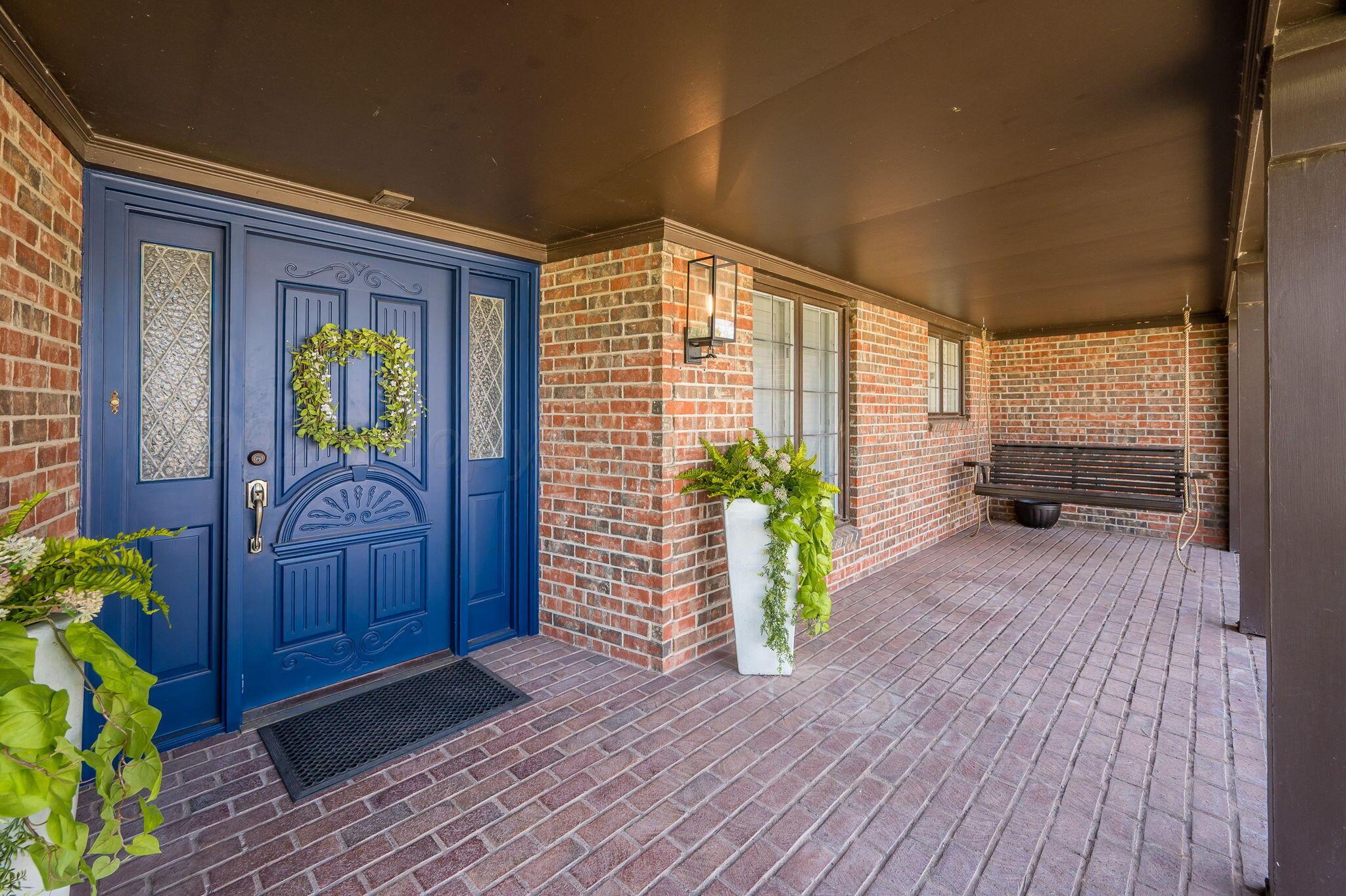 6513 Roxton Drive Amarillo, TX 79109 - Photo 4 of 29 a view of an entryway with wooden floor