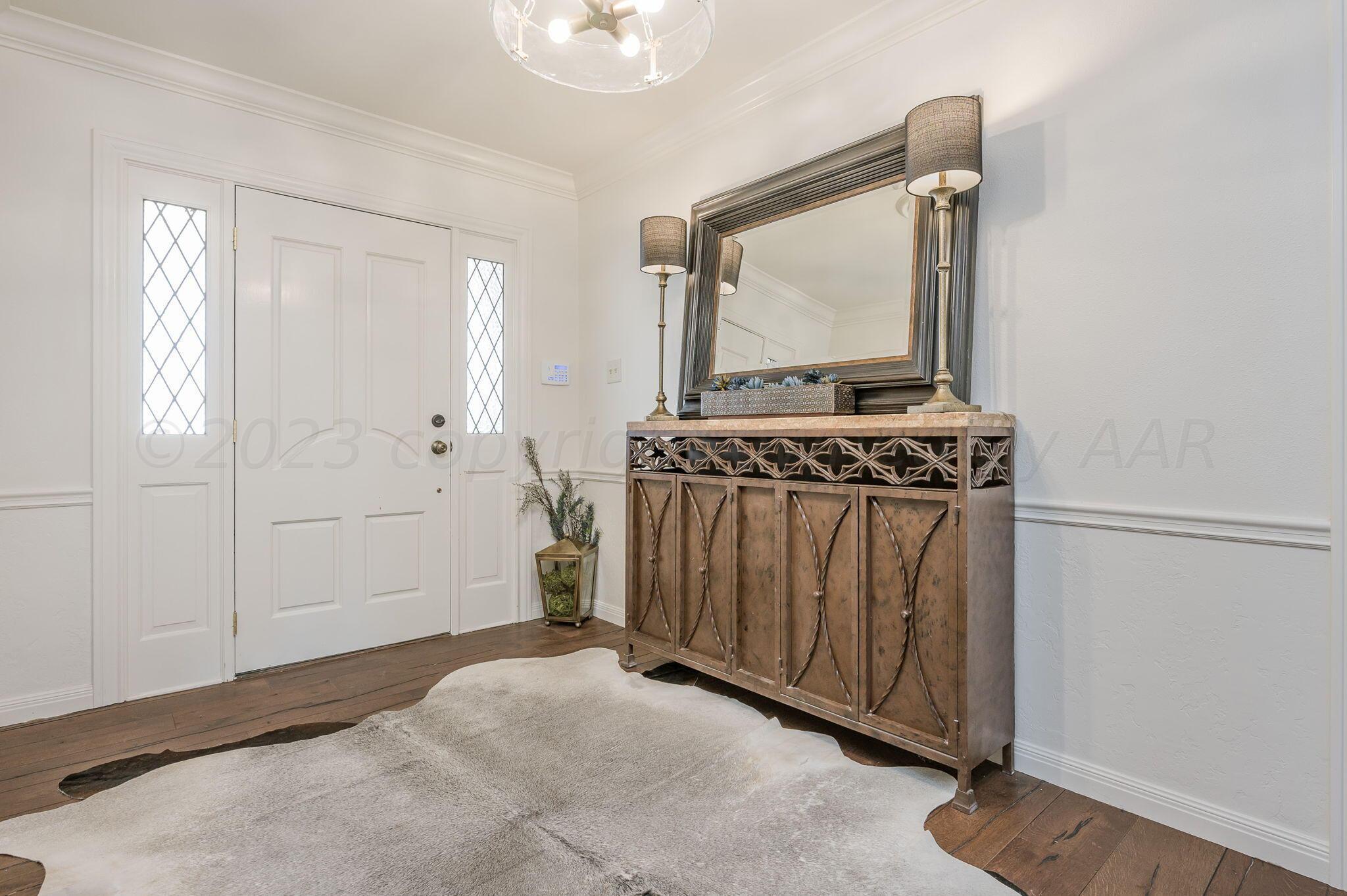 6513 Roxton Drive Amarillo, TX 79109 - Photo 5 of 29 a view of a utility room with a sink