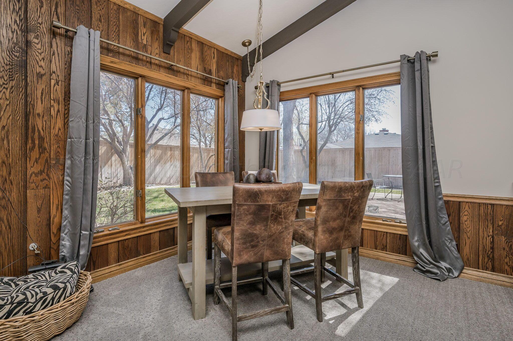 6513 Roxton Drive Amarillo, TX 79109 - Photo 7 of 29 a view of a dining room with furniture window and outside view