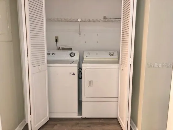 a view of a kitchen with a sink