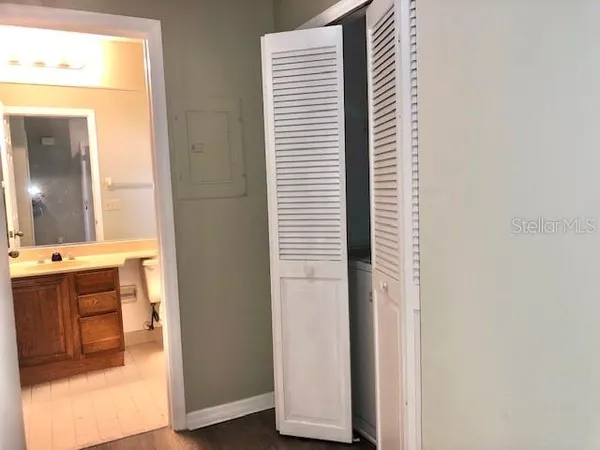 a kitchen with a sink and a microwave