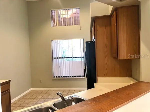 a view of a room with a window and a balcony